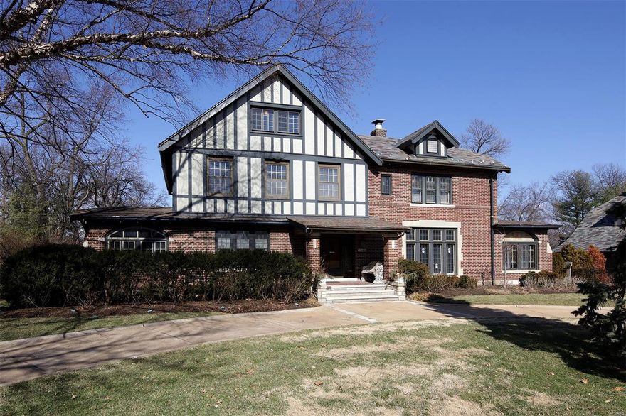 Timeless elegance combined with quality updates, stunning moldings, gorgeous stained and leaded windows, marble and wood floors and arched doorways are just some of the exciting interior features. Two steps down from the large foyer is a light filled living room that has a large fireplace with a beautiful mantle and an intricate iron archway leading to the sunroom. The dining room is party sized with doors that can be opened to the den. Next to it is the office and guest bath. A chef’s eat in kitchen features granite counters, a moveable center island and entrance to the 3-season room which overlooks the fabulous pool and gardens. Three large bedrooms on the second floor have hardwood floors, custom closets and updated baths. The third floor is finished with flexible space for a guest room, playroom or family room. This prime U. City location is walkable to all of Clayton's treasures. A lifestyle perfect for modern and traditional tastes.