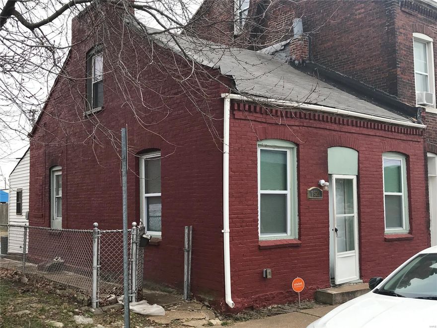 Calling all investors! This 1.5 story slab home in the Patch neighborhood is perfect for your rental portfolio.  Updated and recently refreshed, this 1880 built attached home features 2 bedrooms (one on the main floor and one on the second floor) and 1 bath. A large eat-in kitchen with laundry, pantry and extra storage and living room round out the first floor.  Outside, the fenced back yard features a large patio and a paved 2-car parking area.  Current tenant just moved in on a 1-year lease.  See supplements for Rental Property Verification. Tenants rights apply.