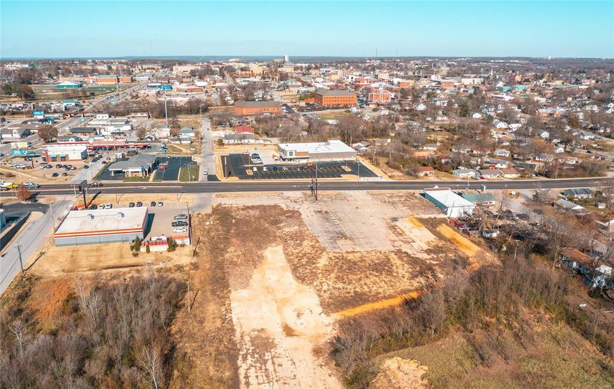 Incredibly Versatile Commercial Use property right on Hwy 72 in Rolla. There's a total of 7.03 acres m/l with 320 ft m/l of road frontage just a turn off of Hwy 63!  This area is very active with high traffic exposure and consists of 5 lots surrounded by a mix of commercial and residential areas.  Location is very close to Walmart and downtown businesses. Existing buildings have been removed per City Codes. Call for additional info! Location: High Traffic