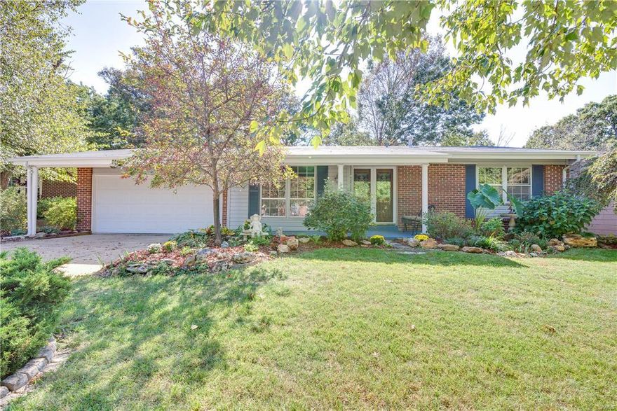 This beautiful home is located in Ballwin & close to everything! It’s charming, updated, move in ready & just waiting for you to call home.   Updates include kitchen cabinets, countertops, backsplash & flooring; bathrooms w/new vanities & tile work; new lighting throughout; new roof, exterior doors & water heater; freshly painted.  The lovely kitchen opens to the four season room w/dedicated heating/cooling unit & offers bar seating at the kitchen window – great for entertaining! The hearth room is located just off the kitchen with gas fireplace and is currently used as a dining room.  The living room offers potential to be turned into shared dining space or office/den/media area.  The walkout basement offers divided space for storage/laundry, a cedar closet & a large open room just waiting for your plans.  Beautiful gardens, professional landscaping & a spectacular backyard that backs to woods - privacy at its finest. No show until Saturday, 10/15 at 10:00 AM Open House. Additional Rooms: Sun Room