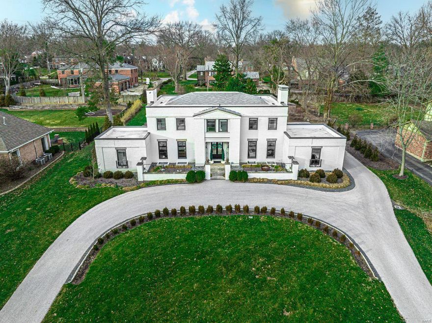 A total renovation of this Ladue home designed by The Muny architect, Ken Wischmeyer, has created a modern masterpiece. Located across from St. Louis CC’s 9th hole, this home has an open flow, tons of light & is a peaceful oasis. The chic foyer has a sweeping staircase & terrazzo floors. The living room is gracious with a gas fireplace & built-in bookshelves. Main-level bedroom with a full bath that is currently an office. A sunroom overlooks an expansive patio & large yard. The kitchen features white custom cabinets, quartz counters, a large center island, Thermador appliances, a 6-burner chef stove & an open dining area. The 1st level also has a den with a fireplace & bar. The primary bedroom is on the 2nd floor with a designer bath featuring 2 vanities, heated floors, soaking tub & walk-in shower. The other 3 upper bedrooms all have en-suite baths. Finished LL with a recreation room with a fireplace & tons of storage. New black Marvin windows. 2-car garage with glass-paneled doors Additional Rooms: Sun Room