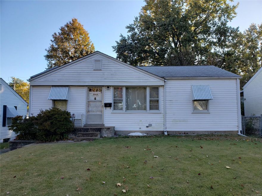 Great Project House.  Almost in original condition with a newer roof, vinyl siding, long side drive way to detached 2 car garage.  Seller wants to sell AS IS. The home has hardwood floors ready to be refinished.  Carpeting was completely removed.  The basement has a long possible Family Room.  This home is a great starter home or investment property for those that like to build sweat equity fast.  Most work is DIY.  The home is priced way below the market for similar updated ranches like it.  Walk to the Airport.  Busses and Metrolink are near by. Woodson Terrace municipal inspection is available online.  The home passed the gas inspection.  Water heater and circuit breaker box is newer.