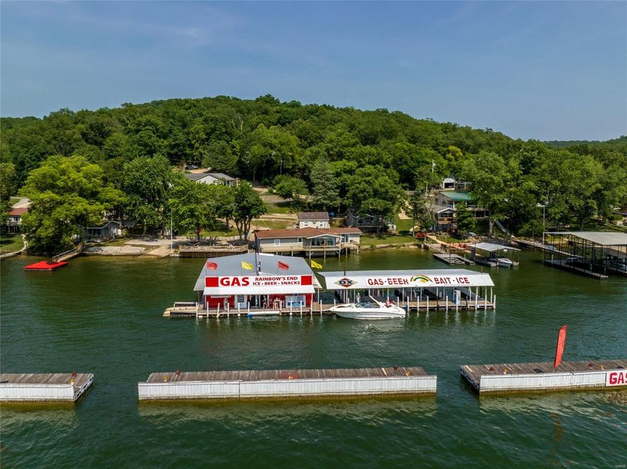 MUST have an appt as this is an active business. Fantastic opportunity to own a profitable & popular marina & resort on the Lake of the Ozarks in a PRIME location by water at the intersection of the Big and Little Niangua! The marina is largely protected by 3 massive wave breaks (huge bonus for gas customers) and comes equipped with a c-store, 10 boat slips, 3 jet ski lifts & 2 jet ski fueling ports. A 4000 gallon, dual wall flameshield tank feeds three dual-sided pumps along 125 feet of dock allowing service for up to 7 watercraft at a time. The resort area features 6 lakefront cabins and amazing views along 268 ft of shoreline, boat ramp, private swim deck and huge martini deck for guests. 4 cabins are 2bed/1bth and can sleep 6-8 guests, 1 cabin is a 1bed/1bth currently used for dock operations but could be rented. The 2bed/2bth owner's house is uniquely positioned at the waters edge with a large private deck and 2-car garage. Already profitable, there's HUGE upside potential here!