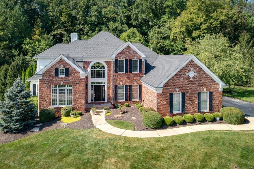 Grand, elegant & stately, this home is nestled on over an acre & has been crafted to offer the finest in high-end luxury. The expansive 5400+ sf layout features 5 bedrooms & bathrooms over 3 levels. The heart of this home is the gourmet kitchen complete with an island, gorgeous cabinetry & a suite of high-end appliances, guaranteed to delight buyers. From here, you can flow through to the hearth room featuring a cathedral ceiling & cozy fireplace. The living spaces are light-filled & beautifully appointed including the finished lower level which also boasts a fireplace, kitchenette & many additional spaces to accommodate the entire family. Step outside to the picture-perfect backyard which promises hours of summer fun. Mature & landscaped gardens envelope the shimmering in-ground pool, complete with a waterfall & sundeck. If playing ball in the backyard is important, there is room for that as well.This home provides private & peaceful living without compromising on convenience.