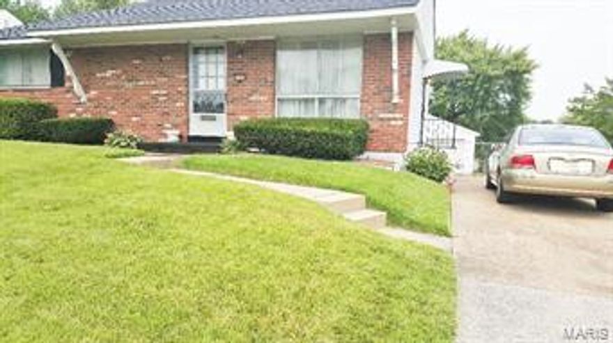 Built in 1965, This Solid well maintained  home welcomes you with a warm hug and allows endless possibilities for your specific needs and customizations. Mature tree lined  neighborhood.  NEW ROOF, SIDING,WATERHEATER and HVAC SYSTEM with Humidifier. Beautiful Hardwood floors throughout. Natural light in every room.  Master bedroom has 2 Cedar closets, Intimate and Charming Kitchen includes gas appliances and refrigerator. Main bath has vanity/ Makeup area and shutters.  3 piece bath with shower in partially finished basement. Washer/Dryer included. Exterior lighting above the detached 1 car garage with wired work bench area and service door.Irrigation system for manicured Zoysia lawn.  Close to public transportation, small businesses, legion hall and parks.Passed Laclede gas inspection and municipal inspection