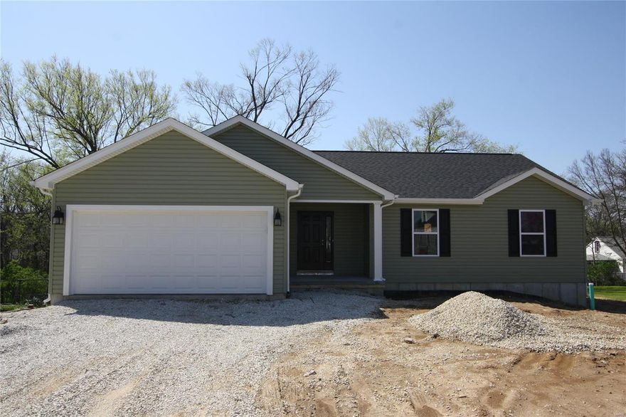 Step into this beautiful new construction home offering 3 spacious bedrooms and 2 full baths. The kitchen features soft-close cabinets, gleaming granite countertops, and sleek brushed nickel finishes—perfect for both everyday living and entertaining. Panel doors add a polished touch throughout the home, complementing the open layout and natural light. Enjoy the full master bath. Step outside to a 10x15 deck ideal for relaxing or hosting guests. The basement is already equipped with an egress window and a roughed-in bath, giving you the opportunity to expand with ease.