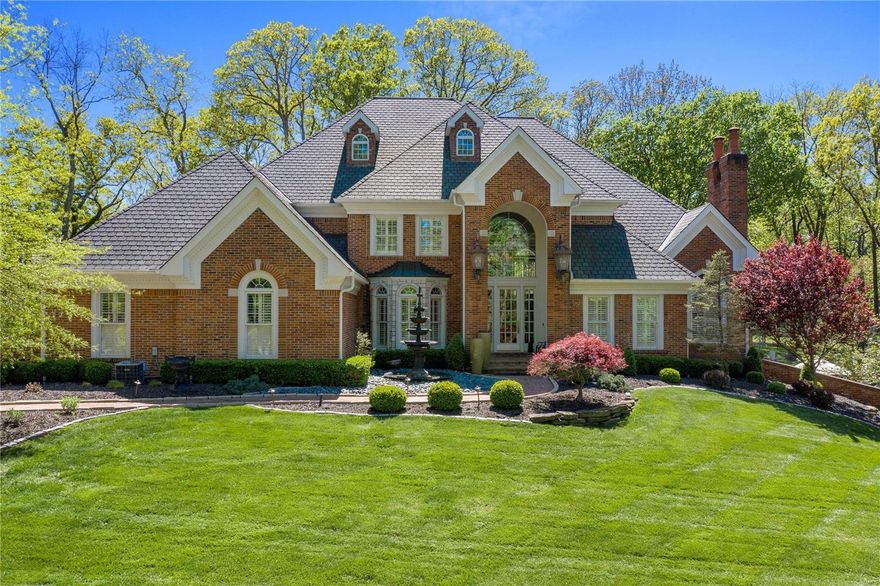 A lavish Wildwood estate sprawling 3.8 acres. As you drive up the long, winding driveway surfaced in stone pavers, you realize that you are in for a treat. Dramatic foyer with a sweeping staircase that leads you to a 2-story living room with vaulted ceiling & fireplace. Formal dining room with tray ceiling. The kitchen features granite counters, gas stove, dual ovens & adjoining sunroom. A lanai offers casual dining & looks out onto the patio of your dreams, equipped with a fireplace, pizza oven, grill & smoker. Large office with fireplace. Main floor primary suite with expansive walk-in closet & master bath with dual vanities, jacuzzi tub & marble shower. 2nd level with 3 bedrooms & 2 full baths. The lower level has a billiards room, wet bar, cigar lounge, gym, recreation rooms, full bath with steam shower & tons of storage. The star of the show is the resort-style pool area equipped with a waterfall, hot tub & gas torches. Putting green. 3-car garage. Main floor laundry.