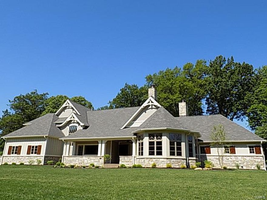 New Construction!! Now Complete!! Price just reduced!  Exquisite  Custom built 1.5 story in sought after Frontenac  Location! Fabulous 1+  acre+ level lot ! Spacious 4+ bdrm, 6 baths, 1.5 story with 3 car side entry garage! HIGH END finishes incl:  Fabulous Gourmet kit. w/ granite, Thermador stainless appl’s, Opaque-Glazed and Stained Custom Cabinetry and Beverage hallway w/ Granite, wine cooler, and ice maker! Schlage Satin Nickel hardware pkg. Generous Vaulted Great rm w/ f/p, breakfast rm. Main floor and 2nd floor laundry! Job finished Hardwood floors on 1st floor. Luxury master suite w/ coffered ceiling and sitting room, private door to covered patio w/ stone fireplace, and more!  “Devonshire” limited lifetime roof, and full lawn and plant bed sprinkler system!  Custom Mahogany front door!  Ready to move in!  1 Year Builder Warranty Free to Buyer!  Executive living at it’s best!!!!