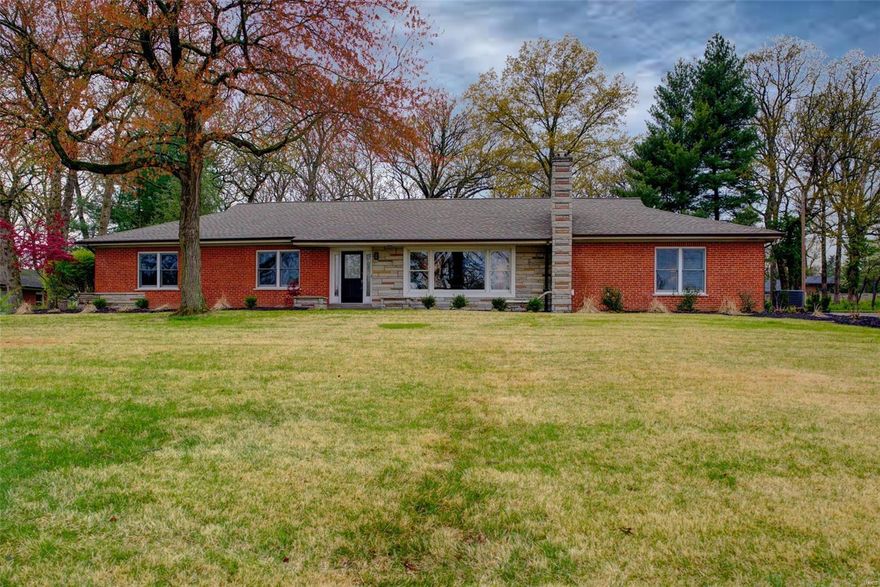 TOTALLY RENOVATED 4 bedrm, 3½ bath ranch home w/approx. 3,000 sq ft of living space situated on 1.03 +/- acres in FANTASTIC location. Master suite features flr-to-ceiling brick FP w/raised hearth, new luxury master bath has full-tile shower, dbl sink vanity, WIC & private commode. One bedrm w/ensuite bath & other 2 share hall bath. New, open concept kitchen/dining feat custom cabinets w/soft close doors & drawers, ctr island, granite sink, Kitchen-Aid SS appls & granite & quartz counters. Living rm has FP w/granite surround & built-ins. Baths remodeled w/new cabinetry, high-end quartz counters & new fixtures. New/refinished glistening wood flrs, baseboards, trim, molding & fresh paint thru-out. New/upgraded plumbing & electrical. Outside: full brick elevation, new roof, new frontage landscaping, new concrete patio & new driveway. Level lot backs to trees/woods. Ladue schools. Owner/Agent.