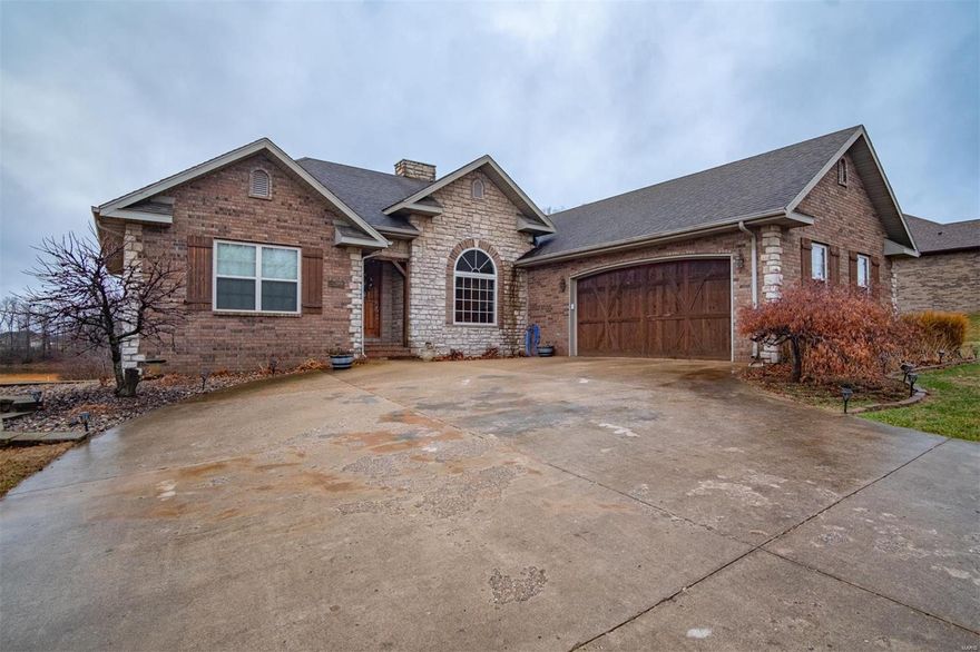 STUNNING 4+ bedroom home in a wonderful Southside neighborhood. The main level of this 3600sf home features hardwood floors, a formal dining room, living room with built in bookcases, gas log fireplace, & a split bedroom floor plan. The kitchen boasts solid surface counter tops, a breakfast nook, pantry, desk area, & an eat at bar. The master suite offers a spacious bedroom with a bright & airy full bathroom with walk in shower, jetted tub, & walk in closet. The opposite side of the house has 2 generous sized guest rooms with a full bath, & just off the garage is a laundry/mudroom & half bath. The sweeping staircase in front of 2 story, floor to ceiling windows in the living room leads you downstairs to the full finished basement which offers a large bedroom, large office/5th bedroom (no window), mancave or media room, a wonderful family room, full bathroom, & a john deere garage. There is a wonderful deck & covered patio to watch the sunsets, & a fenced yard for your littles too!