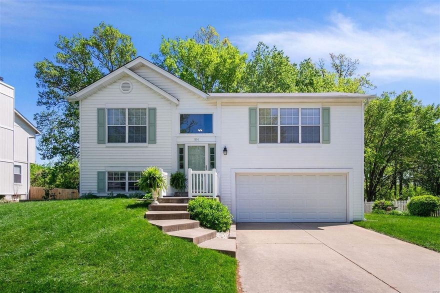 Well cared for and magazine worthy O'Fallon split level home! Curb appeal with fresh sod, beautiful landscaping, and an inviting front porch leads you to a 2 story entrance with an oversized window and lots of natural light. The living room is cozy and open to the renovated gourmet white kitchen. 42-inch cabinets, granite countertops, new appliances, and bright light are shared with the dining room. There are 2 bedrooms upstairs with light oak laminate throughout. The master suite has a large walk-in closet. Downstairs you will find an additional bedroom, a sitting area, a cute bath, and a laundry room with shiplap walls and storage. The garage entry is also located downstairs. The outside 20x24 wood deck is private and backs to a wooded common area.
This home is straight out of Southern Living magazine and beams with ownership pride.