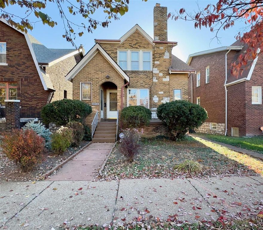 Investment opportunity awaits with this solid two-family home in South City. Each unit features a spacious living room, separate dining room, kitchen, two bedrooms, bath, and sunroom. Beautiful wood floors throughout. The upper unit stands out with a vaulted living room ceiling and open floor plan. Spacious lot with great curb appeal. Explore the large basement, perfect for storage, and enjoy the convenience of a two-car tuck-under garage. A timeless property offering potential for both owner-occupancy and investment.