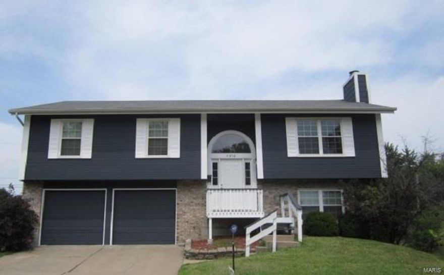 Striking 3+ Bedroom home at the end of cul de sac has room for everyone. Home features generous room sizes, thermal windows, vaulted ceilings, and open floor plan. The wood burning fireplace is focal point in large living room. Skylights in kitchen enhance plenty of cabinets and appliances that stay. Enjoy the breakfast room that opens to upper level deck. Walk out basement offers a cozy family room and den with half bath and closet, could be used as bedroom, and laundry room. Extra shelved storage room running width of garage can be appreciated. Great Price!! Close to Shopping, restaurants, Saint Ferdinand Park. School starts soon, don't delay!!