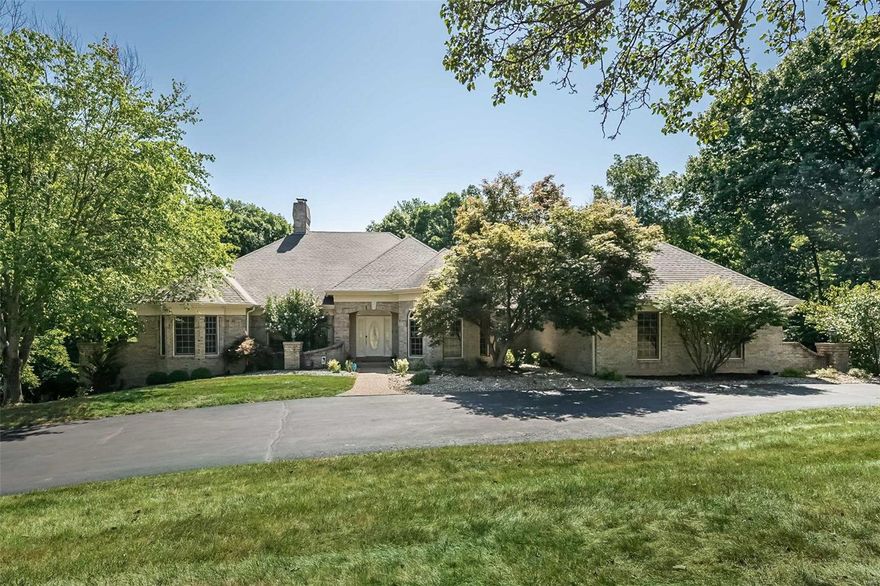 This Homer Award-winning 4bed/6ba atrium ranch spans 5,400sf and is nestled on 2 acres of serene beauty. Tens of thousands of dollars in recent updates blend modern luxury with timeless elegance. 4 car attached garage plus additional detached building ideal for more garage space or workshop area. Both garage areas are climate controlled and feature Lifetime TruGrit flooring. Inside, an architectural masterpiece awaits, a floor plan designed for entertaining while keeping the family in mind! 3 ensuites, vaults, 9 ft ceilings throughout, intricate mouldings, palladian windows, newer carpet, 2 gas fireplaces, heated tile floor in owner’s suite, surround sound main floor, 5 total HVAC systems, 5 A/C's, sprinkler system, radon mitigation system, whole-house humidifier. Outdoor beauty can be enjoyed year-round from the atrium windows, the octagonal screened porch or the covered and open deck area below all overlooking the privacy of the wooded 2 acre lot! Subd. pool, tennis, trails and more!