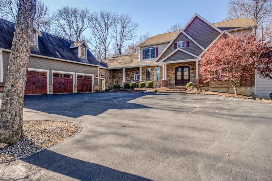 Cust. 1.5 story home on 5.8+/- ac lot. Access to approx 2500ac of Babler park via a private trail, miles of hiking, biking & riding trails. The outdoor oasis boasts natural stone landscaping feat flanking stone steps to a hand cut stone patio, firepit, an outdoor kitchen, & hot tub lend to a relaxing resort feel. Home has perfect flr plan for entertaining. Great room w/gas FP & hardwood flooring offers view of landscaped & wooded backyard. Gourmet kitchen has kemper cabinets, granite counters, Hans Grohe fixtures & SS Thermador appliances, open to the hearth room w/WB FP. Master has 2 walkin closets, bath w/jacuzzi tub, walkin shower w/river rock floor rainfall shower head & body sprays. Also feat 4 add bedrooms w/walkin closets, finished walkout LL w/bdrm, rec room, media room, exercise room(could be 6th bedroom), wet bar, full bath & huge storage area. 3 Car oversized garage w/builtin loft & storage shed. No Subdivision, no HOA fees! Located in the admirable Rockwood School District! Additional Rooms: Mud Room