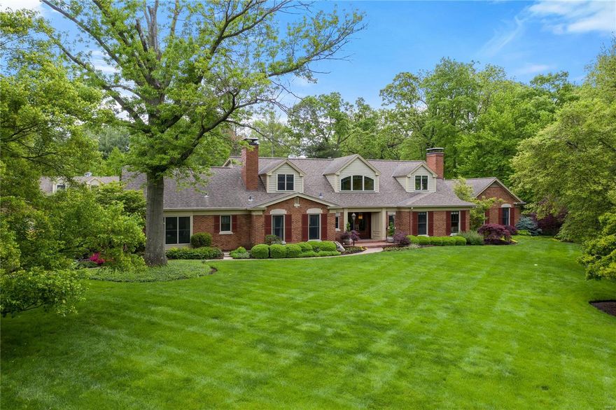 Exceptional Ladue estate off S Warson Rd on 3 magnificently landscaped acres(incredible 34 zones of irrigation) brick 1.5 sty, over 7000 sq ft of liv space. Pebble Tech free-form heated pool & spa, OS 2 car attached gar + 3 car OS Carriage House style gar w/ 34 x 16 loft entertainment room. Paver stone parking area & driveway & fantastic covered outdoor living area with TV & stone surround raised hearth WB FP. Interior is of a refined European look with granite, slate tile, walnut flooring, Mahogany & walnut cabinetry & wood paneling, 5 fireplaces, 6 HVAC systems(4 are hi-eff). Home & grounds are meticulously maintained. Home was completely rehabbed & added onto in 2005, taken down to stud walls, with new elecetric & plumbing. Each bdrm has its own bath, all hard surface flooring on main level. Kitchen features 2 cnt islands, all hi-end applainces, Viking 6 burner cooktop, 2 dishwashers, 2 wall ovens, wine frig, ice maker, etc. walk-in pantry. Redwood wine room capacity 1600 bottles. Additional Rooms: Wine Cellar