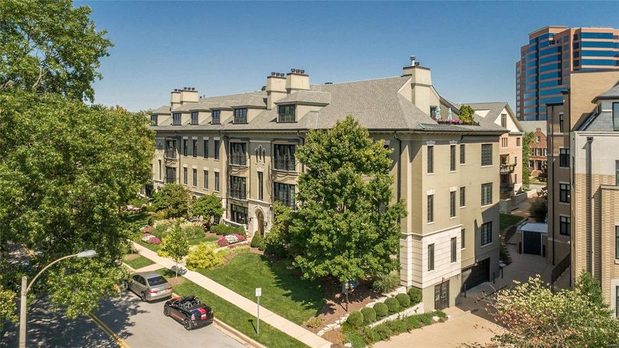 Step off the elevator into the private entry of this impressive 3,856 square foot luxury penthouse in one of Clayton's finest mid-rise buildings. The owners have artfully combined bespoke luxury finishes with open space and dramatic ten-foot ceilings to create chic urban sophistication. Custom built-ins, high profile millwork, and wood floors create a polished aesthetic and welcoming ambiance to this 3bd 2.5 bth residence. Large windows and three private terraces create light-filled living at its finest. Find a gracious living room with fireplace, an elegant dining room and a family room with a wall of built-in bookcases. The custom kitchen with breakfast area has a wall-of-windows with terrace access for alfresco dining. A cove ceiling soars above the stunning master suite with wall-of-windows, fireplace, separate his and her baths, and walk-in closets. Two guest suites, laundry room, abundant storage, 2 parking spaces & Shaw Park at your doorstep complete this exceptional offering. Location: End Unit, Upper Level