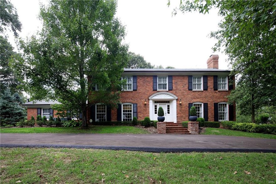 One of the most gracious homes in popular Briarcliff neighborhood.  The curved staircase and large foyer sets the tone for this meticulous 4 bd, 4.5 bath home ready for today's busy lifestyle.  The formal living rm with fireplace and dining rm are perfect for entertaining, while the wood paneled family room with fireplace, located off of the updated kitchen, offers views of the lovely backyard and private patio.  The kitchen offers custom white cabinetry, granite, stainless Subzero and Thermador gas range and is perfectly situated by the mudrm/laundry rm complete with back staircase.  Upstairs find the master suite with large walk in closet and glass enclosed shower.  Two other bedms with great closet space share a hall bath.  Another bedrm suite with lovely private bath completes the 2nd floor.  This home is in perfect condition with lovely touches throughout including, special millwork, plantation shutters, newer HVAC, driveway and more. Additional Rooms: Mud Room