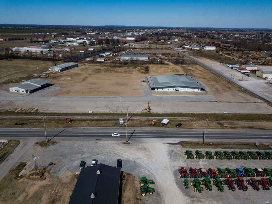 This property consists of three buildings. A  22,500 square foot retail sales building, formally known as ( AG Mart ). A Motorcycle Shop that is 6,000 square feet and a 8,100 square foot open shop building. All this sets on approx 14.5 acres that is elevated and dry. The AG Mart building is very well insulated and has 9 HVAC units, 2 public restrooms, 1 employee bathroom and a FULL bath just off the main office.The lighting in this building has been upgraded to the T8 LED type. The motorcycle shop has been divided in half with the front half used for display and the back half for repairs. This building has 2 bathrooms and 2 offices.