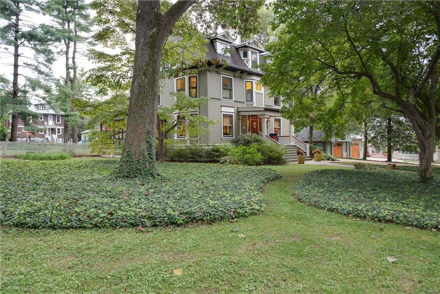 NEW PRICE-Stunning Century home est. in 1900 in in Webster Park.  Period details & luxurious amenities for today's purchaser on a lush level double lot.  The gorgeous entry foyer welcomes you w/a parlor on one side  & a den on the other. Formal dining rm & half bath off the kitchen. Amazing custom kitchen with all the bells and whistles featuring Wolf, Sub Zero, and Asko appliances. Open concept kitchen, breakfast rm and great rm are the hub of the home. Beautifully appointed great rm w/ stone gas fire place, custom built ins, and french doors leading to huge wrap around maintenance free deck. Follow the beautiful period staircase from the front foyer to the second flr or use the back stairs off the great rm. On the 2nd flr you will find 5 bedrms, sleeping porch and 3 full baths w/ laundry rm. Modern conveniences mix elegantly with period details. Follow the hall door to the private 3 rd floor retreat featuring huge rec rm, work out rm, bedrm, & half bath. Perfection in the park!