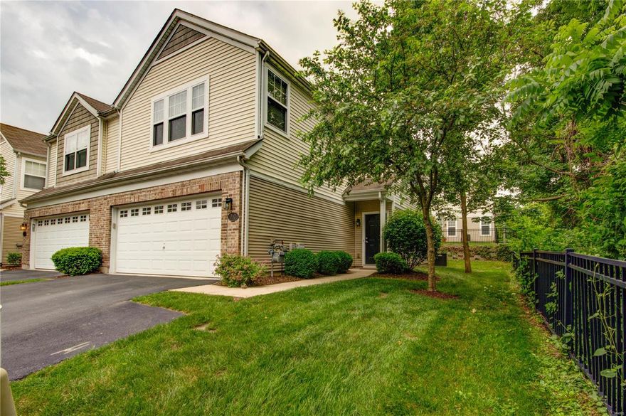 This modern town home in St. Charles is just waiting for its new owners! You'll immediately notice the privacy of this end-unit that is bordered by woods on one side. Enter from the covered front porch to the open layout of the main floor. The bright living room flows into the dining room and spacious kitchen with 42" cabinets and plenty of counter and storage space! Sliding doors from the dining room lead to the patio shaded by mature trees that's perfect for grilling and enjoying the summer weather! A half bathroom completes the main level. Upstairs, the master suite boasts dual walk-in closets and a bathroom with a large vanity. Two more bedrooms, a full bathroom, and convenient laundry room round out the space. In a great location, just moments from Downtown St. Charles, Lindenwood University, shopping, highways, and restaurants, this home is one you won't want to miss! Location: End Unit, Suburban