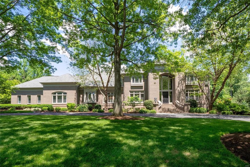 *Showings begin Fri. June 11*Outstanding custom contemporary Johnson built home situated on professionally landscaped acre with pool located in exclusive gated Litzsinger Place, Ladue schools! Open floor plan: 2 story foyer w/unique etched glass partition, dramatic 2 story great rm w/floor to ceiling windows offering views of private backyard, fireplace, wet bar, dining rm w/built-in buffet, powder rm w/stainless vanity, spacious family rm opens to stunning 2015 renovated kitchen & breakfast rm w/custom cabinetry, center island w/breakfast bar, Cambria quartz countertops, stainless appliances, walk-in pantry, laundry rm, 2nd half bath, master bdrm suite w/luxurious master bath & two walk-in closets complete main level. Second level: 3 additional bdrm suites each w/full bath & walk-in closet, bonus rm/playroom. Finished walk-out lower level:recreation room w/full kitchen, exercise/game rm, bdrm 5 suite w/full bath, walk-in closet, office, full bath w/steam shower, storage. 4 Car garage.