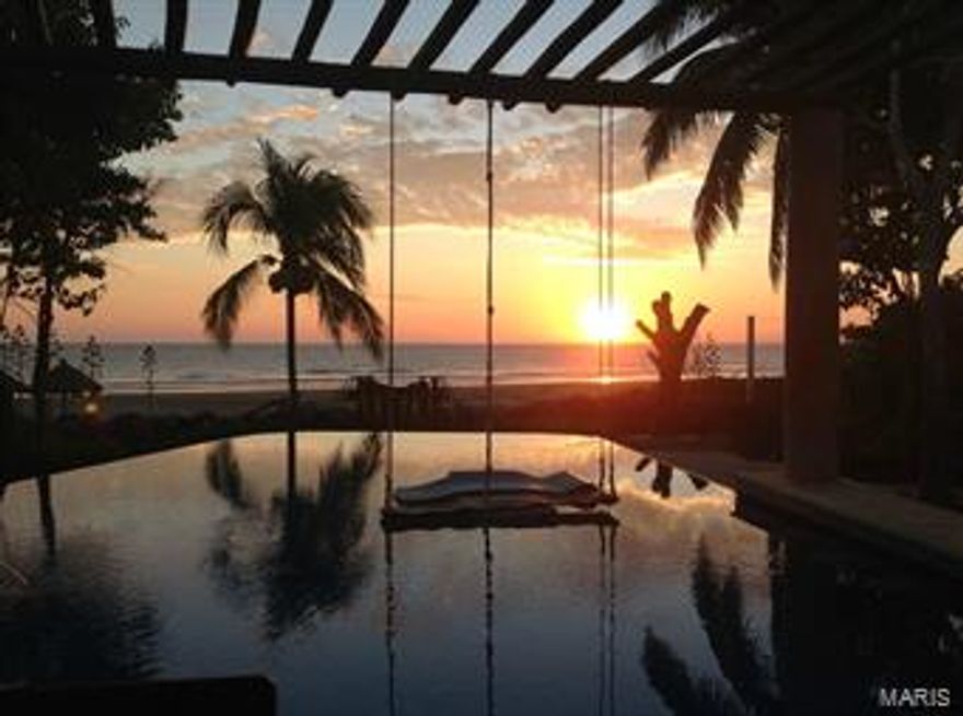 Imagine yourself enjoying the sun setting w/a glass of wine in your private infinity pool overlooking the sweeping views of the beach & the Pacific Ocean! This one of a kind beach front home boasts 3 spacious bedrooms, loft sleeping area, 4 baths & sleeps 14 comfortably. Each bedroom has large private baths, walk-in closets & private terraces. Master bedroom has private bath & balcony overlooking the beach. Large modern kitchen, Dining room table accommodates 14. Great outdoor entertaining area & lush gardens. Infinity pool w/built-in bar stools to enjoy the sunset. 40 meters of sandy beach frontage, 1/2 acre double lot. Separate caretakers quarters w/kitchen, bedroom/bathroom. 3 car garage w/dehumidifier.Could be private home, B&B, corporate retreat. Troncones is just minutes from Ixtapa/Zihuateneo & major airport. Troncones boasts an avg. of 300 days of sunshine a year, make your appt today to view this home. Sold turn-key w/all furnishings, only a few personal effects will be taken.