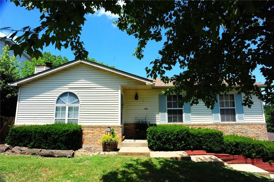 Perfect ranch on large corner lot in the attractive community of Hermitage Hills. Enjoy beautiful, expansive tree-lined lake that is a part of this private, quiet neighborhood. Main floor master and bath, 2 additional main floor bedrooms w/ their full bath. Open and spacious, the kitchen and living room empty out onto big deck. New ceiling fans. Large brick fireplace. Updates in kitchen. Living room atrium window for great interior light. As comfortable in the summer as in the winter. Deck overlooks beautiful back yard. Very private thanks to attractive wood fence. Perched up on the hill property overlooks handsome neighborhood below. Enjoy peace & quiet while dining on the deck or have the yard party. Kids and dogs will love this yard space/a mini paradise! Large, wide drive. Large 2 car garage off excellent family room on lower level. Great for in & out!  Laundry not small. Works as a craft rm/work rm. Half bath in lower level as well. Enjoy this little gem! Seller to do no repairs.