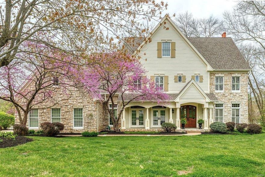 Beautifully designed 2-sty Estate home from award-winning Premier Homes. Over 7000 sf of living space enhanced by the finest in craftsmanship & meticulous attention to detail. Impressive hardwood foyer leads to private study, elegant dining room with 2 sets of French doors & spectacular great room with marble fireplace & wet bar. Designer kitchen with granite countertops, 42” cherry cabinetry, premium appliances & butler’s pantry adjoins breakfast room with wide bay window & atrium door to deck & hearth room highlighted by floor-to-ceiling stone fireplace. Broad oak staircase with palladian window & display cases accesses master bedroom suite with luxury bath with jetted tub & 3 additional bedrooms, 1 with ensuite bath & 2 with Jack n’ Jill bath. Walk-out Lower Level includes recreation room with direct vent fireplace, game room, 2nd kitchen, workout room, 5th bedroom & full bath. Situated on a 1+ ac cul-de-sac lot with deck & resort style pool & patio surrounded by landscaped gardens.