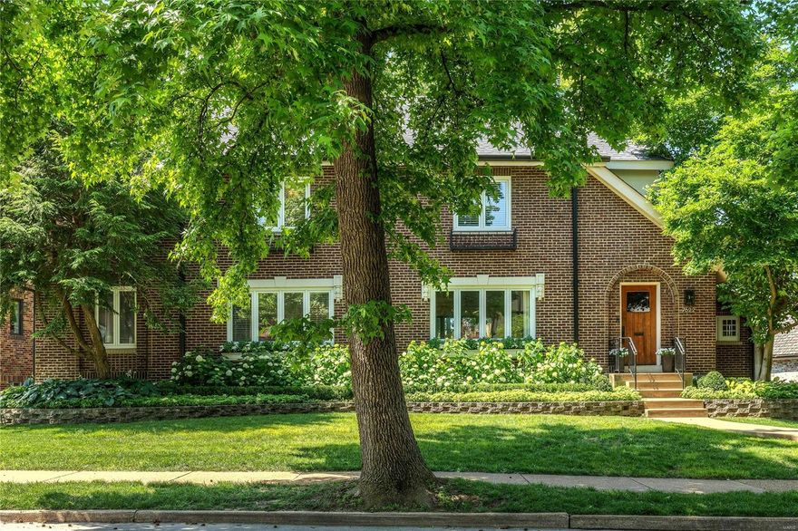 Fantastic New Price! Resting in popular Wydown Forest is a wonderful home that offers modern updates and is walkable to shops, restaurants and parks! Elegant, classic details are accented with swanky design elements throughout and generous, open gathering spaces provide for activities and entertaining in style.  The dining room's new built-in cabinetry includes a fold-out secretary, dry bar, storage and seating, allowing for casual living or formal occasions.  The kitchen features a breakfast bar island, stone countertops, Subway tiled backsplash and new KitchenAid appliances.  A charming sun room unites the two spaces. Upstairs are a sophisticated master suite, two gracious bedrooms and an updated hall bathroom.  The lower level is finished and walks out to the back yard, which is level, fenced and walks up to a wonderful Pergola deck.  Updates include new HVAC, gutters, irrigation system, cabinetry, KitchenAid appliances and more. Vogue & effortless living!