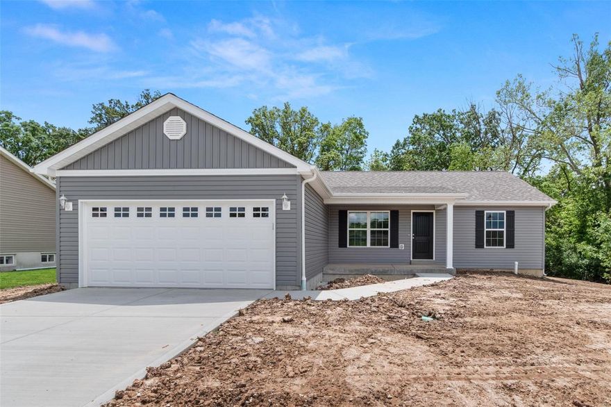 The "Breeana" model under construction is loaded with upgrades and features 1288 sq.ft. 3 bedroom divided floor plan, 2 baths and 2 car garage ranch home in a great community on nice lot that transitions to common ground and trees. The open floor plan welcomes you with recessed can lights, vaulted ceiling in living room and kitchen, stainless steel appliances, upgraded center island, ceiling fans in living room & master, brushed nickel hardware, and master bedroom with full bathroom. Enjoy the main floor laundry/mud room, walk in master closet, and the views from your large front porch. The full walkout basement includes a sliding glass door, window, and bathroom rough in for your future finished expansion. The exterior of the home features maintenance free vinyl siding with upgraded 4 board shutters, upgraded garage doors with windows, and patio for your entertaining needs. VA, FHA and USDA zero down financing eligible home. Estimated completion late spring. Agent owned.