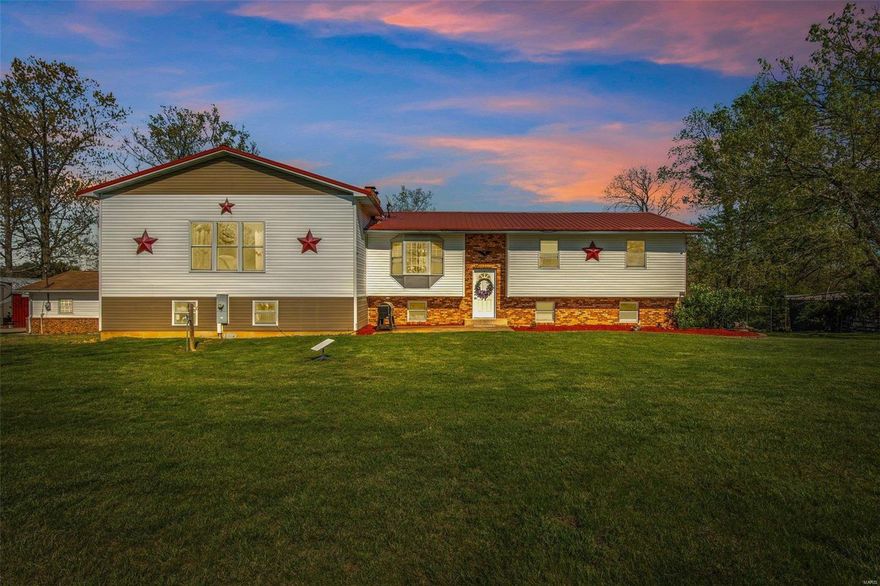 Amazing home in the country!! Just outside of Bonne Terre sits this split foyer home on 3 acres. Home has been nicely updated and has a 32x30 addition that adds incredible living area. The upper level features 3 bedrooms and a main bath There is also a living room with wood burning fireplace.   Original hardwood floors throughout the original main floor of the home. The kitchen features oak cabinets. The lower level Master Suite with separate bath and closet as well as the laundry and utility areas. Walk out to a hot tub and swimming pool! There is an outside wood stove to heat the home AND the oversize two car garage with 10 foot ceiling!  Above the garage is the 30 x 28 ft family room addition with barnwood finish walls and plenty of room for family dining, entertaining and more!!  Outside there is a 24 x18 shop, 2 sheds, pond ,large manicured yard and so much more!!  The home sits back off the road for plenty of privacy and quiet country life.  Don't miss this one!