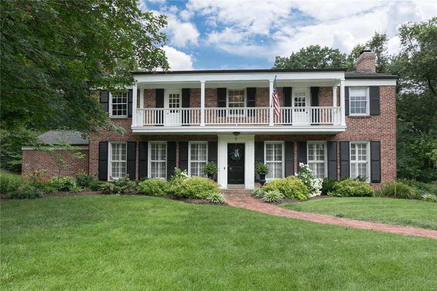 Charming & classic LADUE home with lovely ¾ acre lot on quiet, private lane with cul-de-sac. Light & bright, this spacious 5 bed, 4 full & one ½ bath home features hardwood floors, classic millwork & fresh neutral paint throughout. Front entry easily flows to gracious living room with oversized windows & fireplace, dining room with bay window & light-filled den/office with Murphy bed plus another fireplace. Sunroom w/ vaulted ceiling opens to brick patio & private gardens perfect for relaxing & entertaining. Renovated light & bright kitchen w/ custom white cabinets, granite tops, center island & BR; main floor laundry & updated full bath. Upstairs primary bedroom w/ bath and bedroom#2 both open to delightful Juliet balcony overlooking front yard. Another ensuite bedroom/bath plus two other bedrooms with Jack & Jill bath. Partially finished LL has rec room w/ kitchenette, ½ bath & storage. Backs to lush landscaping & Carmelite grounds. Walk to shops & schools. Explore the possibilities! Additional Rooms: Sun Room