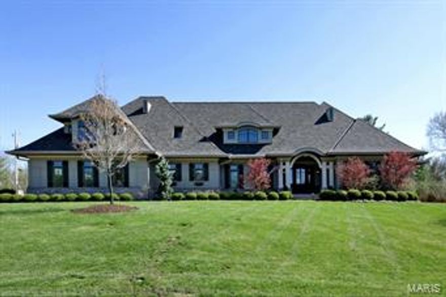 Open House Sunday, 5/17 from 1pm to 3 pm. 
Imagine yourself in the English countryside... This charming story and a half home (5B, 7b) on one acre includes Great Room with dramatic ceiling heights and stone fireplace, beautiful first floor master suite and an incredibly crafted kitchen.  French doors and windows overlook an outdoor oasis with veranda and pool.  Warm and welcoming, the upstairs bedrooms surround a common family room; lower level has 10 foot ceilings, stone fireplace, full kitchen, bedroom, and full bath.  Stunning landscaping and outdoor spaces. Look closely so as not to miss a single, thoughtful detail!!!