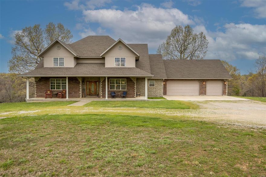 Minutes from BENNETT SPRINGS STATE PARK…Custom and quality-built home, located on breath-taking, 59+ acres of fenced and cross-fenced pasture and woods. Over 5500sqft of living space includes 5+ bedrooms, 4.5 bathrooms, den and so much more. Main floor offers large living room, open to the kitchen and dining room. Kitchen is equipped with double oven, trash compactor, cooktop, fridge and custom-built, tall cabinets. Den located off of the foyer has built in bookcases, desk and lots of natural light. Main level master suite is spacious, bathroom with jetted tub, double sink, shower and waking closet and built-in shelves. Beautiful hard wood floors, fireplace and high ceilings is what add warmth and character to this amazing home. 3 additional bedrooms and 2 bathrooms are located on an upper level. Basement is finished adding additional bedroom, storage and JD room located directly under the 3-car garage.30x50 shop with a RV hook up is just a cherry on top.