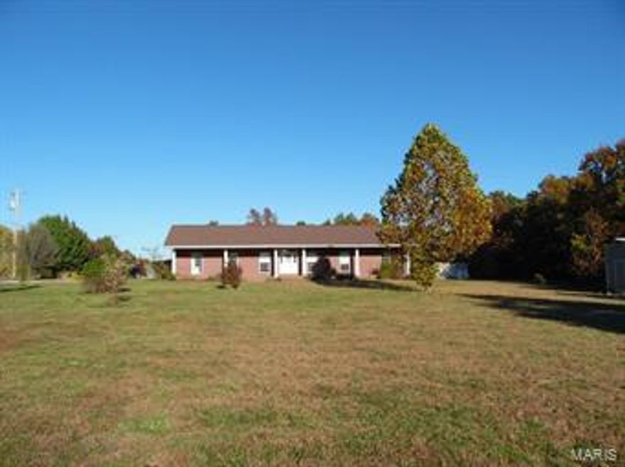 All Brick Home on 3.33 Acres! This three bedroom, two bathroom ranch style home sits on a crawl space. Step into the living room with its hardwood floors, recessed lighting and a vaulted ceiling. The large formal dining room with hardwood floors is the perfect space to entertain your dinner guests. The kitchen features hardwood floors, white appliances and an island. The king size master bedroom has hardwood floors and a 8x3 closet. The master bathroom has ceramic tile floors, a corner jetted tub, a separate shower, and a vanity sink. The other two bedrooms also have hardwood floors and the guest bathroom has ceramic tile floors. Other features of this home includes a covered front porch that is the full length of the house, a wooded flat back yard, natural gas, and a 20x12 shed. Call for a showing today!