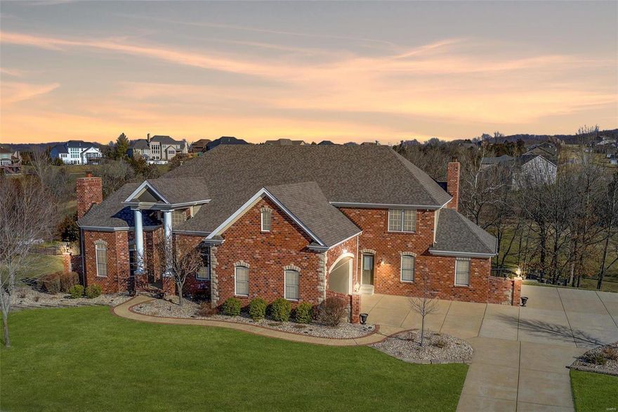 WOW! Doesn’t get much better than this. Beautiful 1.5 story in Pevely Farms Golf Course Community. Three minutes from I-44 +  Rockwood Schools too! 2-story entrance with marble floors leads you to the great room w/20' soaring ceiling-wall of windows overlooking salt water pool/spa, fireplace, grill and golf course. Main Fl. master bdrm with sitting room, fireplace, en-suite master bath with walk-in oversize shower, soaking tub & heated floors. Dining room, office w/fireplace, hearth room w/fireplace, laundry room with 2nd half bath & gourmet kitchen round out the main level. Winding staircase to 2nd floor w/four bedrooms and three bathrooms. Large bedroom with en-suite bathroom, jack-n-jill + another bedroom with private access to hall bathroom. All rooms large enough for king beds. Also large 2nd family room area. Walk out LL w/family room, game table area, craft rm or 6th bdrm, movie room, large wet bar, wine cellar, and full bath. Large patio bar area (TV stays) Welcome to paradise! Additional Rooms: Wine Cellar