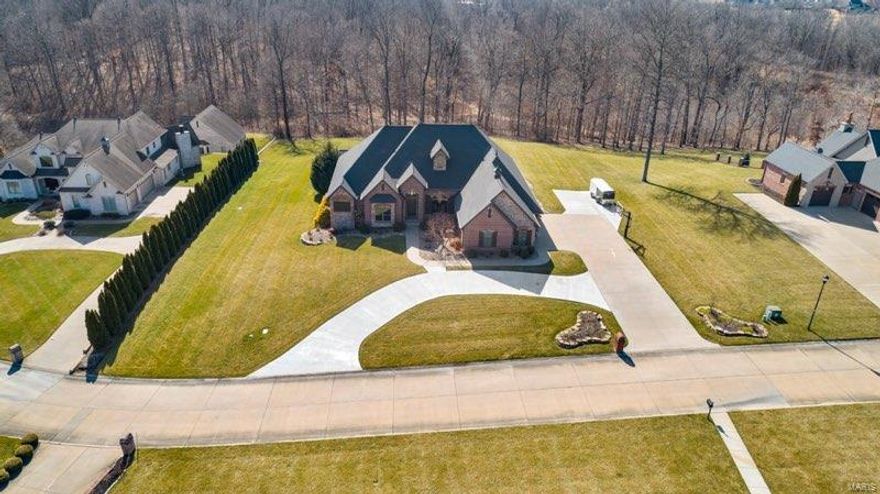 Let’s talk about perfection!  This approx 5,370 sq ft home has everything you need on the main level w/ office, formal dining room, laundry, master suite with fireplace, over sized walk-in closet & a beautifully remodeled bathroom w/ stand alone tub & shower.   The great room on the main has a vaulted gas fireplace that looks into kitchen & dining area.  Off the kitchen are 2 bedrooms with a “Jack & Jill” full bath.  The oversized 3 car garage is heated & there is additional storage above.  The basement provides ALL the entertainment you will need!  Walk into a large family room full of windows that over look the back patio & pool & showcases gas fireplace, w/ a bar & kitchenette.  On one end you have a large bedroom w/ hall bath & storage behind.  There is a theatre room, bonus room, & additional storage!  This home is a must see w/ MANY updates including new circle drive out front & parking pad.  Updates, amenities, utility bills & items remaining w/ the home are in supplements.