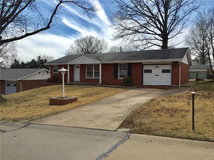 A very cute, open and inviting brick ranch in the desirable Indian Hills subdivision. As you enter thru the front door, you are welcomed in to a large living/dining room combo with hardwood floors. The kitchen has nice wood cabinets and a ceramic tile floor. Down the hallway is the full bath with ceramic tile floor. Rounding out the main floor at the end of the hallway are two bedrooms with hardwood flooring, double closets and dual windows. There is a one car oversized attached garage. The backyard features a covered patio and fenced yard. House has great bones but needs some TLC! Short sale…seller to do no repairs or inspections. Property being sold as-is. Property must be listed in the MLS for 15 calendar days before accepting an offer. SpecialListingConditions: Short Sale