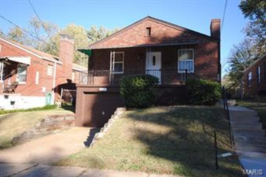 Highest and best offer is due by 12pm Friday, 11/6 with a response time of 12pm Saturday, 11/7.  

A very charming 1,144 square foot bungalow in the Franz Park/Dogtown/Hi-Pointe neighborhood.  This 3/1 home has original wood floors throughout and has a fireplace in the living room.  The kitchen has been updated and has slate flooring, white cabinets, and stainless appliances.   Wood deck off the kitchen overlooks the large, flat yard.  The basement has a washing machine and dryer (will stay with the sale) and a one car garage.  Priced to sell quickly!