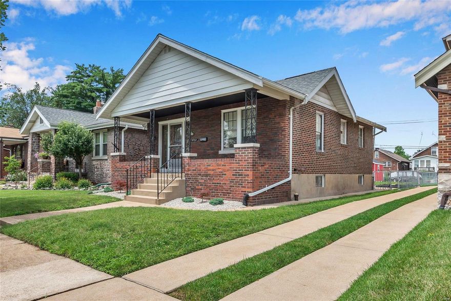 Absolutely adorable brick bungalow loaded with character and charm plus huge covered front porch!  Light-filled office/nursery could be guest room. Beautiful stained glass windows flank the fireplace & highlight the din rm.  Gorgeous wood floors, updated kitchen with stainless appliances, smooth top stove, built-in microwave, refrigerator stays, large pantry & door to 2nd covered porch.  Stylish retro bath with tub/shower & linen closet.  Classic tall sidelights frame the wood & glass entry door, fenced yard, spacious newer storage shed & 2-car parking pad. Many additional updates include ALL NEW ELECTRICAL 2021, NEWER FURNACE & A/C, NEWER ROOF, walkout basement ready for future finish, washer & dryer stay, walking distance to many amenities! MOVE-IN-CONDITION!!! Housing Conservation District Section Certificate of Inspection completed. Shows beautifully and easy to show!