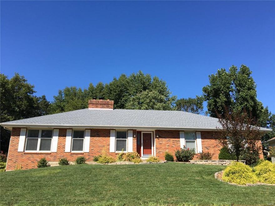 Enjoy the lake life in this FULL BRICK RANCH on a gorgeous level lot with water-views in front. With nearly 4000 sqft of living space, this home features large rooms while maintaining a warm and inviting charm. The light-filled Living Room/Dining Room combo is ideal for entertaining and features wood flooring and crown molding. The updated Kitchen includes stainless steel appliances, a Breakfast Room and opens to a large Great Room with wood burning fireplace and wet bar. Off the Great Room is a sunken Den that is currently used as a playroom. The MF Master Suite includes a large private bath with double vanity and 2 closets. The Main Floor also includes 2 exceptionally large Bedrooms, Full Bath and Laundry Room. Newly renovated LL features new carpet and fresh paint in Rec Room and stained concrete in gaming area. LL also includes large Sleeping Room and Full Bath, 2 Storage Rooms. Rear Entry Garage, Inground Sprinkler System, and Fenced Dog Run. Full Lake Rights. A Must See!