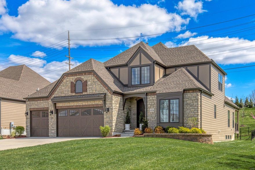 Built in 2021, this beautifully appointed home offers premium features in an ideal location. The low-maintenance exterior invites you into the foyer adjoining a study with French doors. Beautiful wood flooring covers most of the first floor. The stunning kitchen includes top-of-the-line GE Monogram appliances, nugget ice machine, quartz counters and pot filler. A gas fireplace anchors the great room with plantation shutters and premium lighting. Step onto the covered composite deck with an extension that leads down to the fenced yard planted with dozens of trees. The main-floor primary suite includes one of multiple custom closets and a bathroom with double vanities, separate tub and shower, plus a heated floor. Two second-floor suites include upgraded baths. Another bed and full bath in the lower level join a large recreation space with a wet bar. Among many other upgrades, a Smart Home package provides peace of mind and convenience. HOA fee covers the lawn and snow. Don’t miss out!