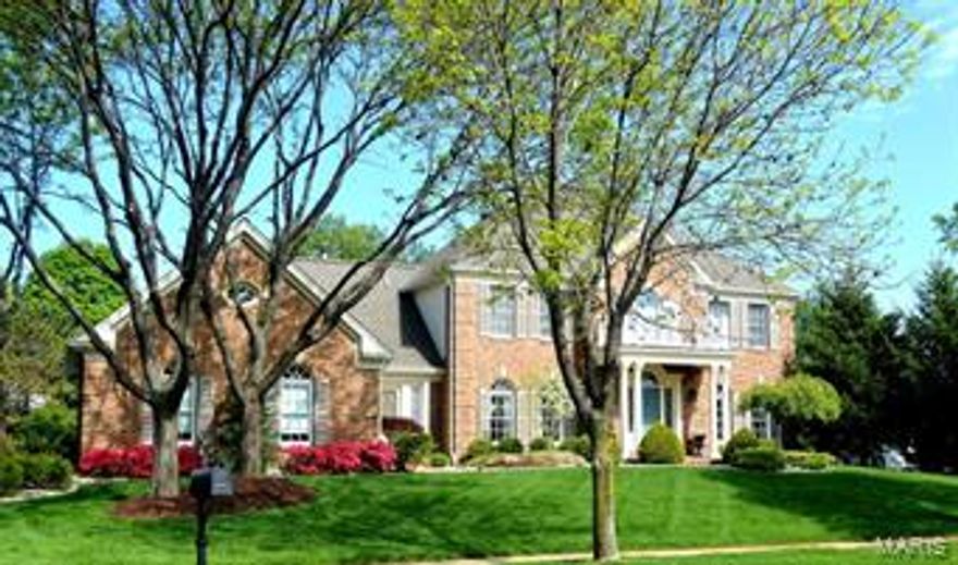 Magnificent 2 Story with 4 bdrms, 3 full bths & 2 half bths. This home has extensive moldings, Formal DR, Lib/Den w/ built in shelving, Grt rm with brick wb fplc, french doors, wood plantation shutters, full walk behind bar with ice maker, sm fridge, & sink.  Gourmet kitchen with center island, breakfast bar, hard surface counter tops, 5 burner Dacor gas cook top, all stainless appliances, 42" custom cabinets, Vaulted Breakfast room, with built in planning desk & built in shelves.  Main floor Laundry with exterior door, walk in closet & wash sink. Hrdwd flooring, Gorgeous Mstr Bdrm Suite with triple cove & crown moldings, plus a gas fplc.  Mstr Bath has double sinks, custom cabinetry, lg soaking tub & seperate walk in shower. 2 Bdrms share a private Jack & Jill Bath and Bdrm 4 has a private full bath and walk in closet.  Huge fin LL with rec room, game room, wet bar, planning desk, built in shelves, and tons of storage. Large Lot with stunning inground private pool. Zoned Htg & Clng,