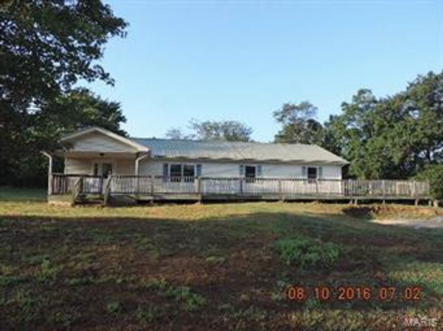 THIS WONT LAST LONG! HURRY! Come view this Cute, Crisp & Clean Ranch style home with beautiful views! This home is nestled on 5.3 acres, surrounded by nature! This home features a great floor plan offering 3 bedrooms, 2 1/2 baths, Living room, Den/Family room & there's even a beautiful Sun Room to soak up the vitamin D! This home is full of updates all throughout, and who wouldn't love spending evenings out on the front/deck! You'll love the updated kitchen with custom cabinets & ceramic time, the living room has nice wood walls, the bedrooms all have ample closet space. This home has lots to offer! The family mechanic will LOVE the huge 40 x 60 Metal Shop with 14 ft. sidewalls WITH electric! CALL TO SCHEDULE YOUR APPOINTMENT TODAY!!! SpecialListingConditions: Foreclosure Additional Rooms: Sun Room