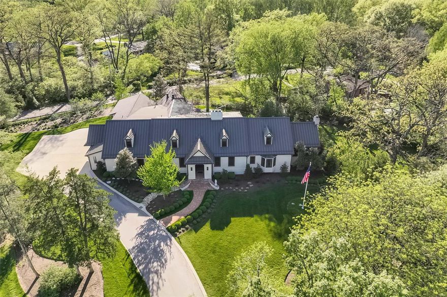 One-of-a-kind classic 1.5 sty has been expanded, remodeled & updated w amazing attention to detail from 2016 to present. Tucked back on almost acre of lush greenery & manicured gardens in one of Ladue’s most premier neighborhoods. Welcoming front & side porches. Enter & immediately appreciate gracious moldings, detailed ceiling treatments, abundant built-in cabinetry. Chef’s delight gourmet kitchen w 9X8 center island w prep sink, marble counters, top of line appliances & detail beyond belief is the gathering place of the home w adjoining hearth room leading to charming screen porch w 1 of 5 fireplaces. There is also an updated prep kitchen w Quartzite counters. Main floor owner’s retreat w dressing rm, lovely bath w lg custom shower w steam option & sitting rm w fpl & abundant built-in cabinetry. There are 2 powder rms & main flr laundry. Upstairs has bonus area, 4 lg suites w updated baths – 1 w dbl bowl sinks & 1 w triple bowl sinks. Unique metal roof. OS 3 car garage w heat & ac.