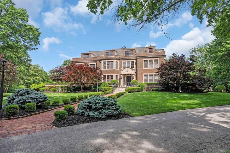 Welcome to the historic 1910 Cella Estate in Ladue, meticulously updated architectural gem by Higginbotham. This home blends timeless elegance with modern luxury, featuring period-appropriate updates, grand entry, library, formal dining room, and wine cellar with tasting room. The pro-series kitchen includes Wolf appliances, Sub-Zero refrigeration, island, and an eat-in area opening to a terrace. First and second floors boast over ten-foot ceilings. The second floor has a laundry room, 3 bedrooms,
two full baths, and a luxurious master suite with a sitting room, marble bath, dual vanities, tub and shower, and a spacious closet. The third floor offers versatile space for guests or an au pair. A porte-cochère leads to a 1,400-sq-ft lounge/sports pub with a full bath, steam shower,and full kitchen. The 8-car HVAC-equipped garage offers ample space. Outdoors, enjoy a Pebble Tec pool/spa, fireplace, golf green, and serene terraces and courtyards. Experience a private and peaceful retreat. Additional Rooms: Wine Cellar