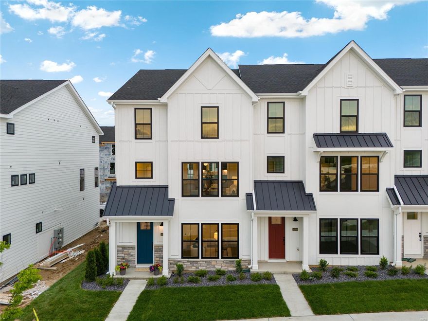 Why wait for a new build when you could have it now? Stunning 4 bed 3.5 townhome featuring 3 levels of open living space & water view! Wood vinyl plank, neutral paint, modern light fixtures, & fantastic upgrades are just some of the features in this move in ready home. Step inside to find a main floor bedrm/work from home office & gorgeous full bath w/ custom tile walk in shower & comfort height vanity. The well appointed 2nd level offers gourmet kitchen w/ huge center island, soft close cabs w/ undermount lighting, high end stainless appliances, walk in pantry, & fantastic custom wet bar! Spacious dining rm, living rm, & beautiful powder rm round out the space. Upper level features large primary suite w/ walk in closet, dual vanities, soaking tub, & stunning custom tiled shower. 2 add'l bedrms each w/ double closets share a modern 3rd full bath. Other features include 3rd floor laundry, 2 car garage, zoned HVAC, composite deck & LOCATION! Minutes from hwy 40 & popular shopping/dining. Location: End Unit, Suburban