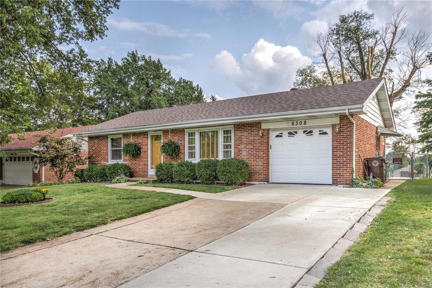 Perched near the end of a quiet cul-de-sac, this gorgeous turn-key Cool Valley residence is ready to be called home. This fantastic property features a well manicured front yard, all brick low maintenance exterior, garage, back yard patio and a spacious fenced-in back yard. You are welcomed to this this property by a nice sized living room that features plenty of natural light and gleaming wood floors (found throughout). A large dining room will provide plenty of space for entertaining. The kitchen is beautiful and includes ample cabinet space, nice tile floors, stainless steel appliances, wine fridge and backsplash providing plenty of additional aesthetic. Down the hall you will find two spacious bedroom, both with wood floors and ceiling fans. The full bath is stunning and features updated vanity and lovely shower with glass enclosure. The finished basement perfect for gatherings and features movie area, hangout space and plenty of additional storage.