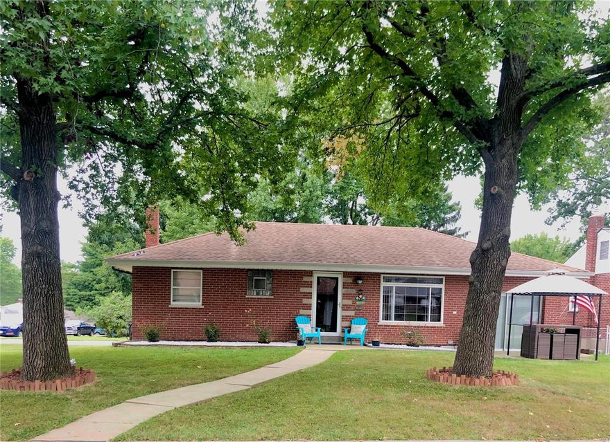 This wonderful full brick ranch with a detached garage and welcoming gazebo is settled on a level corner lot and has 3 bedrooms, 2 full bath, with in-law quarters in lower level, is waiting for you!
This home offers 2 kitchens, a family room and a living, with a possible extra sleeping room! Beautiful hardwood floors throughout the upstairs and this home has been well maintained. Lets talk about location, minutes away from highway 55, 270, 30 and more. Also minutes away from activities like Grants Farms. 
Schedule your Showing today! Additional Rooms: Mud Room